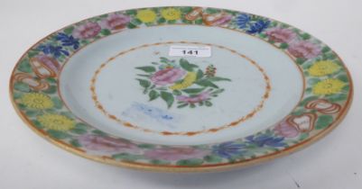 A late 18thC Chinese porcelain Sancai, decorated in colours with floral designs  9"dia