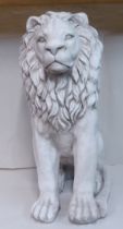 A white painted moulded composition, seated heraldic lion  24"h