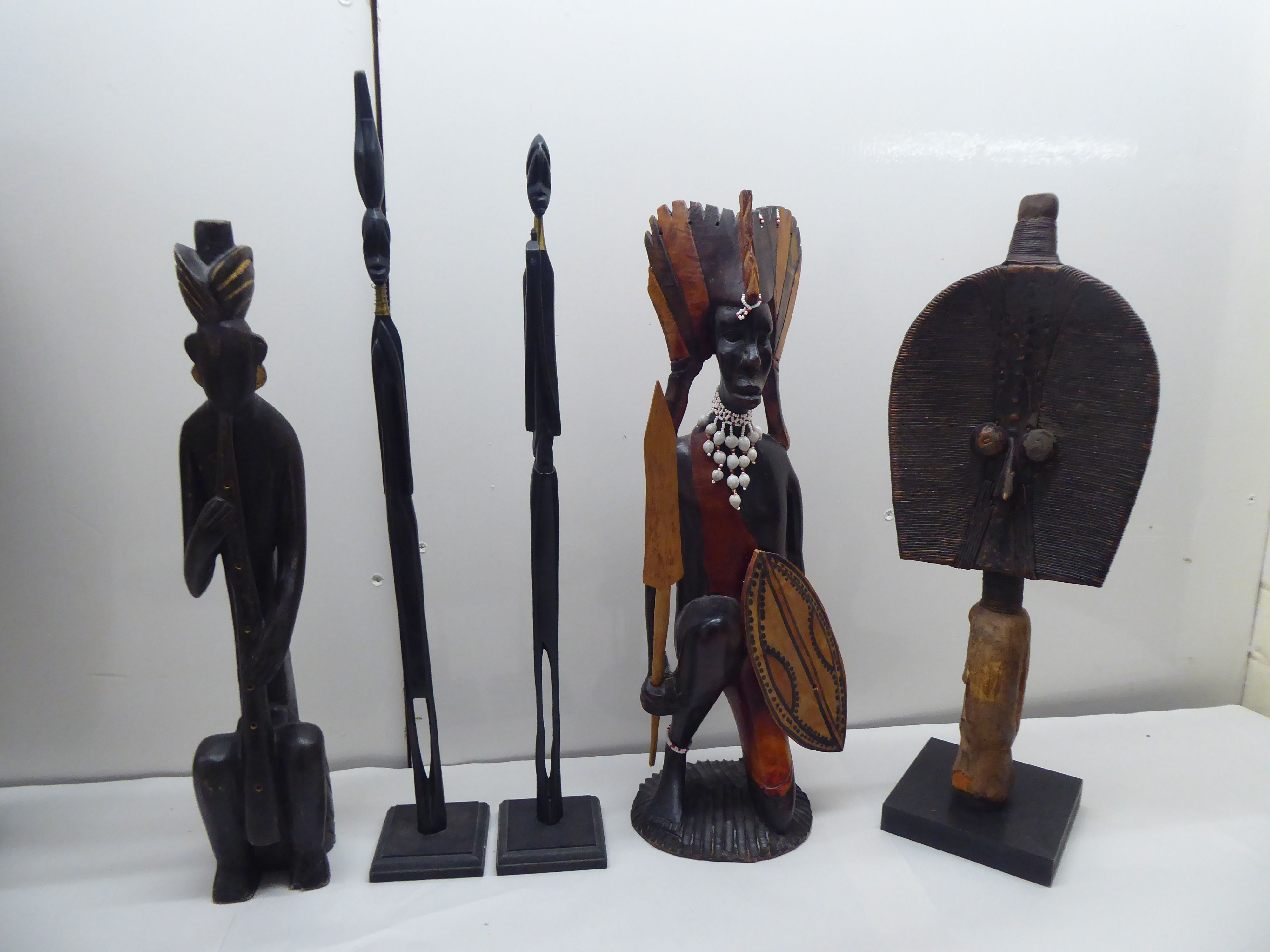 A mixed lot: to include African carved wooden figures  various sizes; and a hide covered drum  23"h - Image 5 of 6