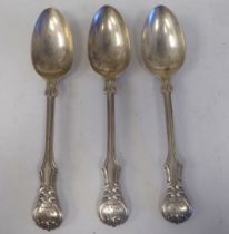 A set of three Victorian silver fiddle and thread pattern dessert spoons  London 1844