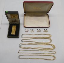 Items of personal ornament: to include cultured pearl necklaces; and a Dunhill cigarette lighter