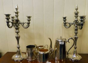 Silver plate: to include a pair of three branch candelabra, over a demi-reeded column  20"h