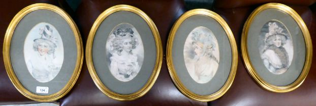 A set of four framed Victorian style oval coloured prints, half length portraits of women wearing