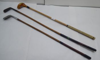 Three vintage golf clubs: to include a St Andrews MK VII wooden putter