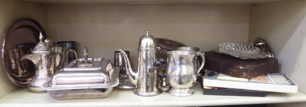 Silver plated ware: to include three mugs; a tureen and cover; and a foreign white metal coffee pot