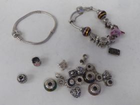 Two Pandora bracelets with various charms