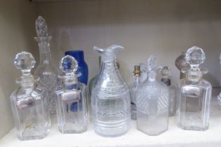 Glassware: to include a pair of decanters and stoppers with canted corners  10"h