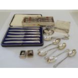 Two sets of six silver handled tea knives  cased; and other silver items  mixed marks