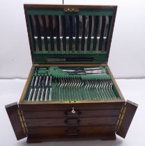 A 1930s oak canteen of silver plated cutlery and flatware