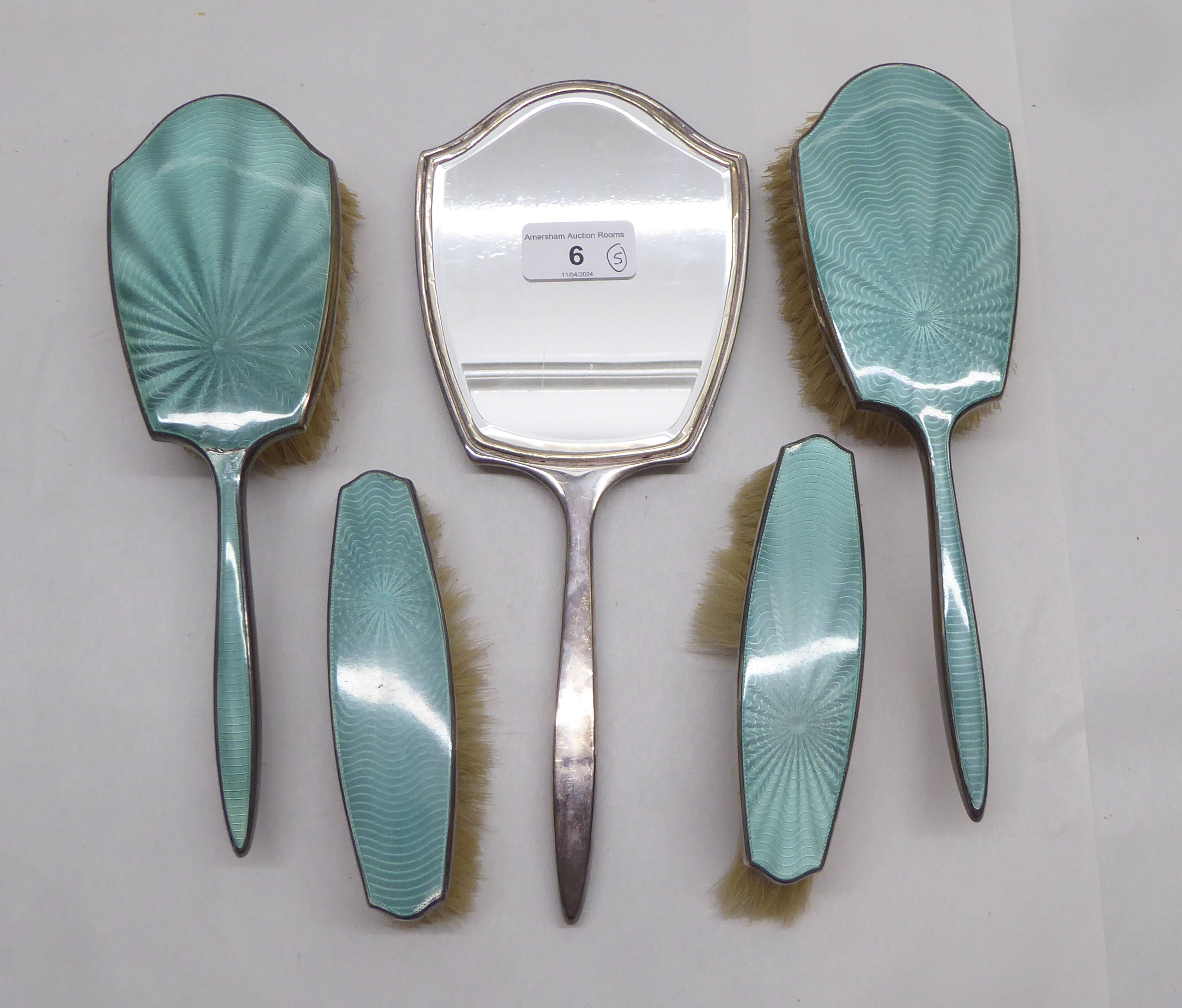 Five items of silver backed and engine turned enamel dressing table set  Birmingham marks rubbed
