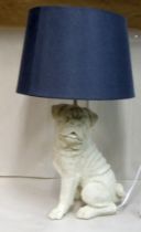 A novelty table lamp, fashioned as a pug with a blue fabric shade  22"h overall