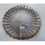 A silver coloured metal dish with lobed decoration  stamped BCB .9584  13"dia