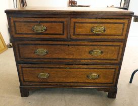 A George III oak dressing chest with two short/two long drawers, raised on bracket feet  21"h  37"w