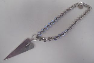 A white metal necklace, set with a stylised love heart pendant  stamped 925