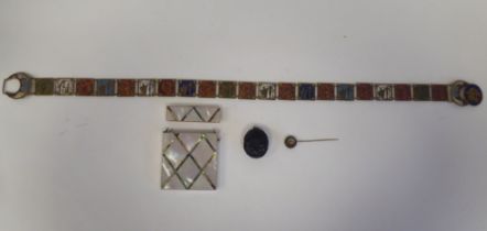 Items of personal ornament: to include an enamel and metal belt; and a locket