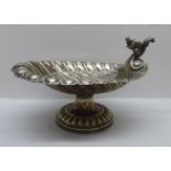 A mid 20thC Walker & Hall silver plated pedestal nut dish, surmounted by a squirrel  6"h