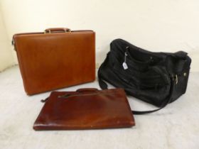 Luggage, viz. a black elephant hide, zipped holdall; a Blendford's of London, Italian stitched brown