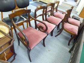 A set of six mid 20thC Regency style mahogany framed dining chairs, each with a bar crest, over a