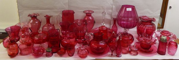 Cranberry coloured glass ornaments; and functional items: to include an oversize brandy glass  12"h;