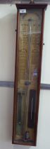 A late Victorian Admiral Fitzroy's mahogany cased barometer, incorporating a thermometer and