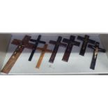 Seven similar wooden crucifix with variously cast metal Corpus Christi  largest 15"h