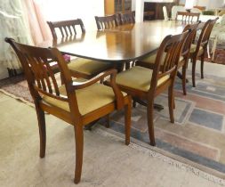 A modern reproduction of a Regency design string inlaid, mahogany finished, twin pedestal dining