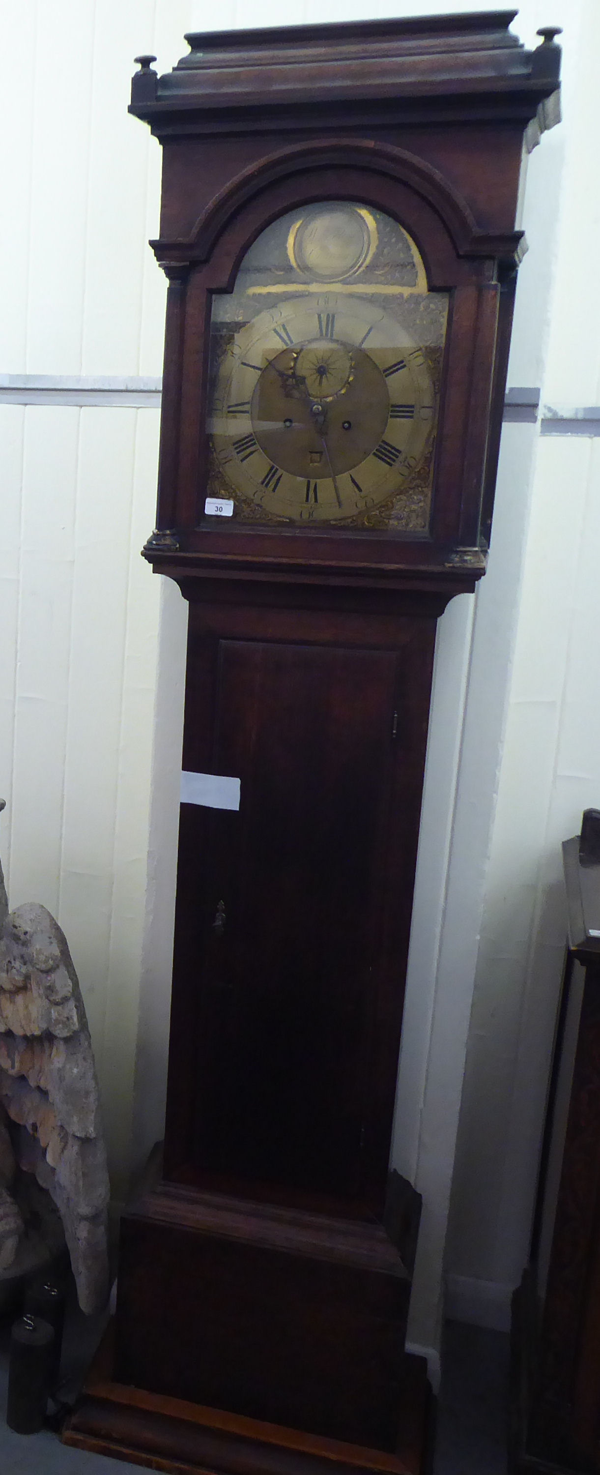 A mid/late 18thC oak longcase clock; the single fusee movement inscribed WM Flint of Charing   83"