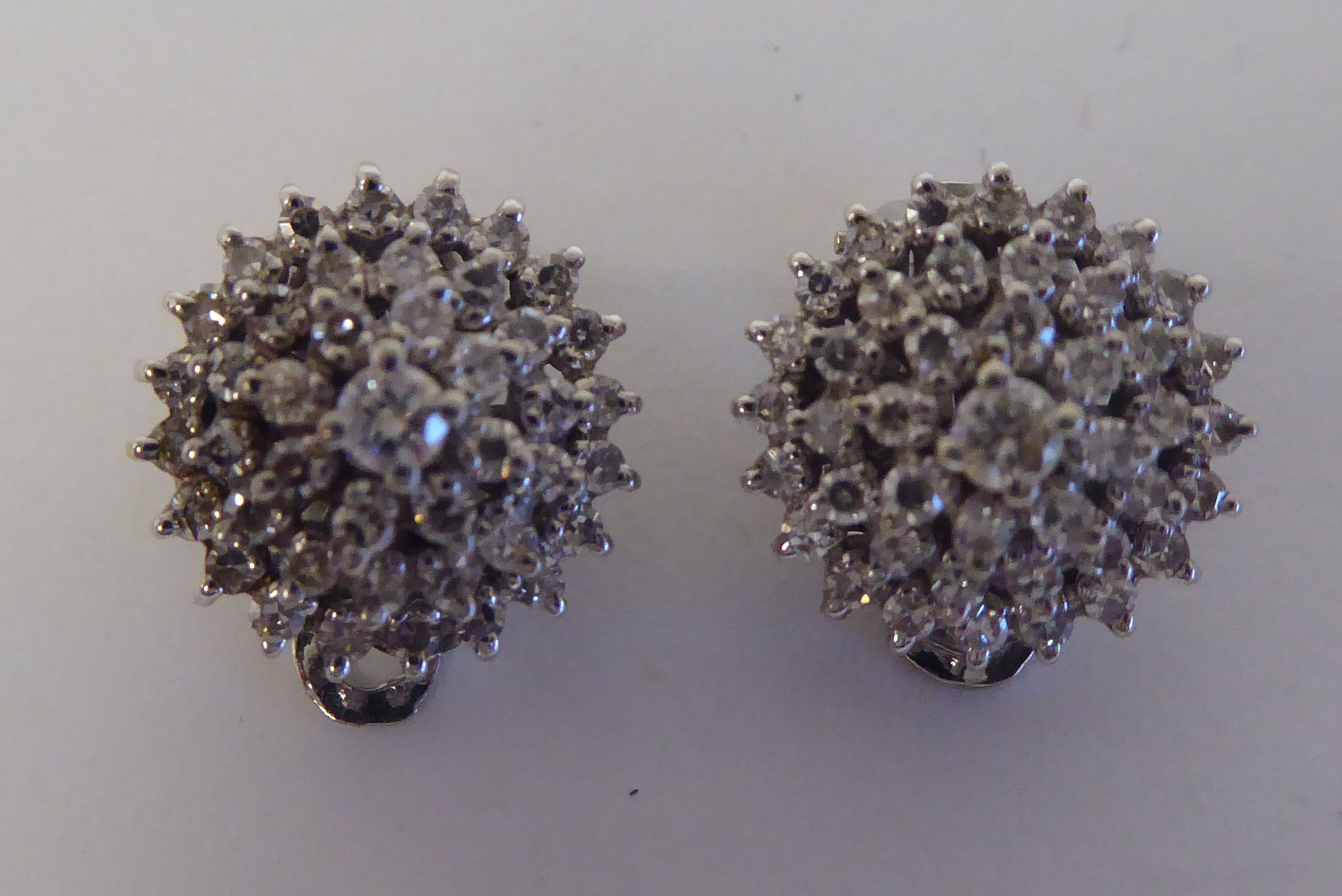 A pair of 14ct white gold, diamond set, cluster earrings - Image 2 of 3