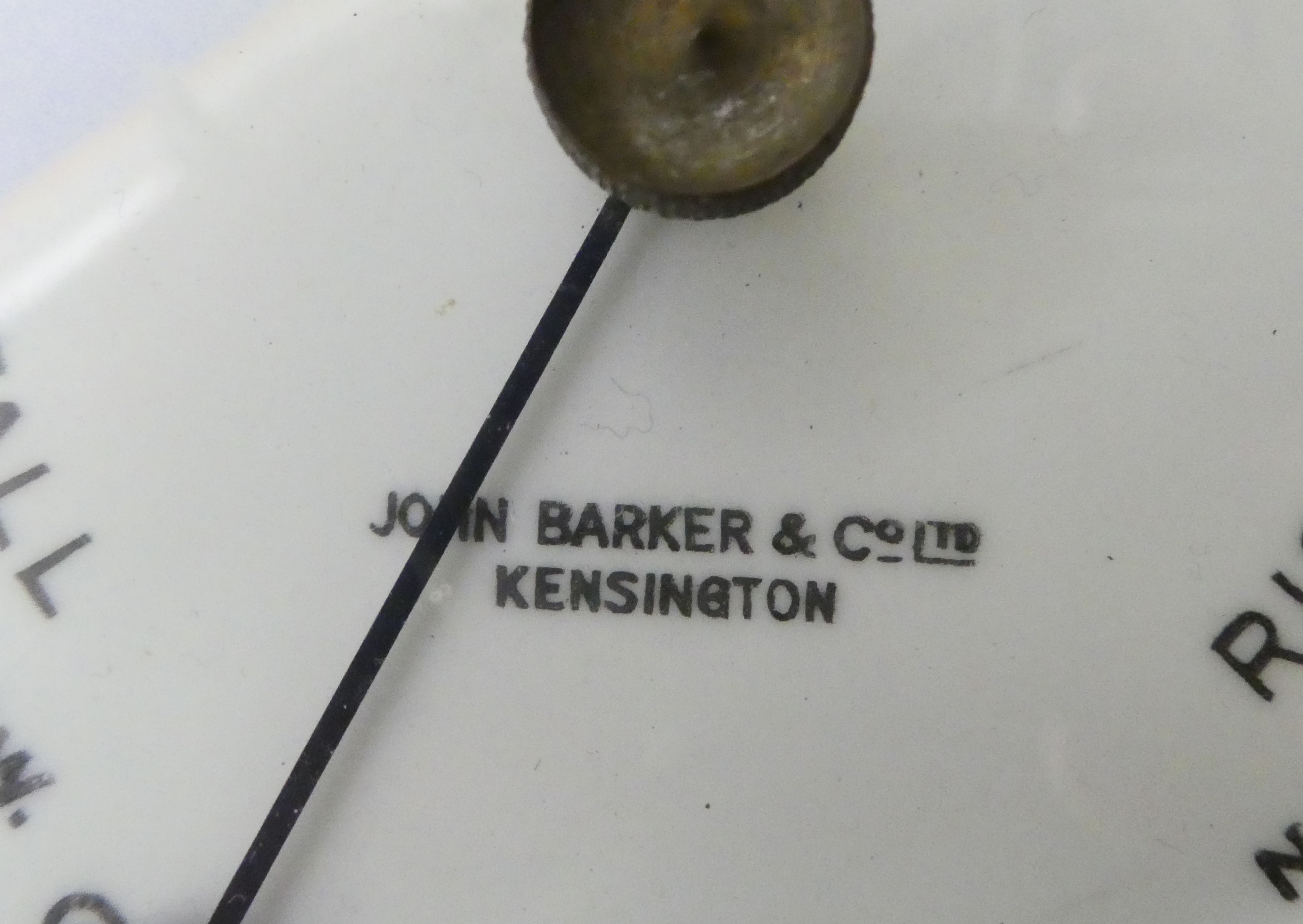 An early 20thC John Barker & Co of Kensington lacquered brass cased barometer  11"dia - Image 2 of 2