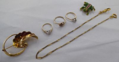 Yellow metal items of personal ornament: to include two 9ct gold cubic zirconia set solitaire rings;