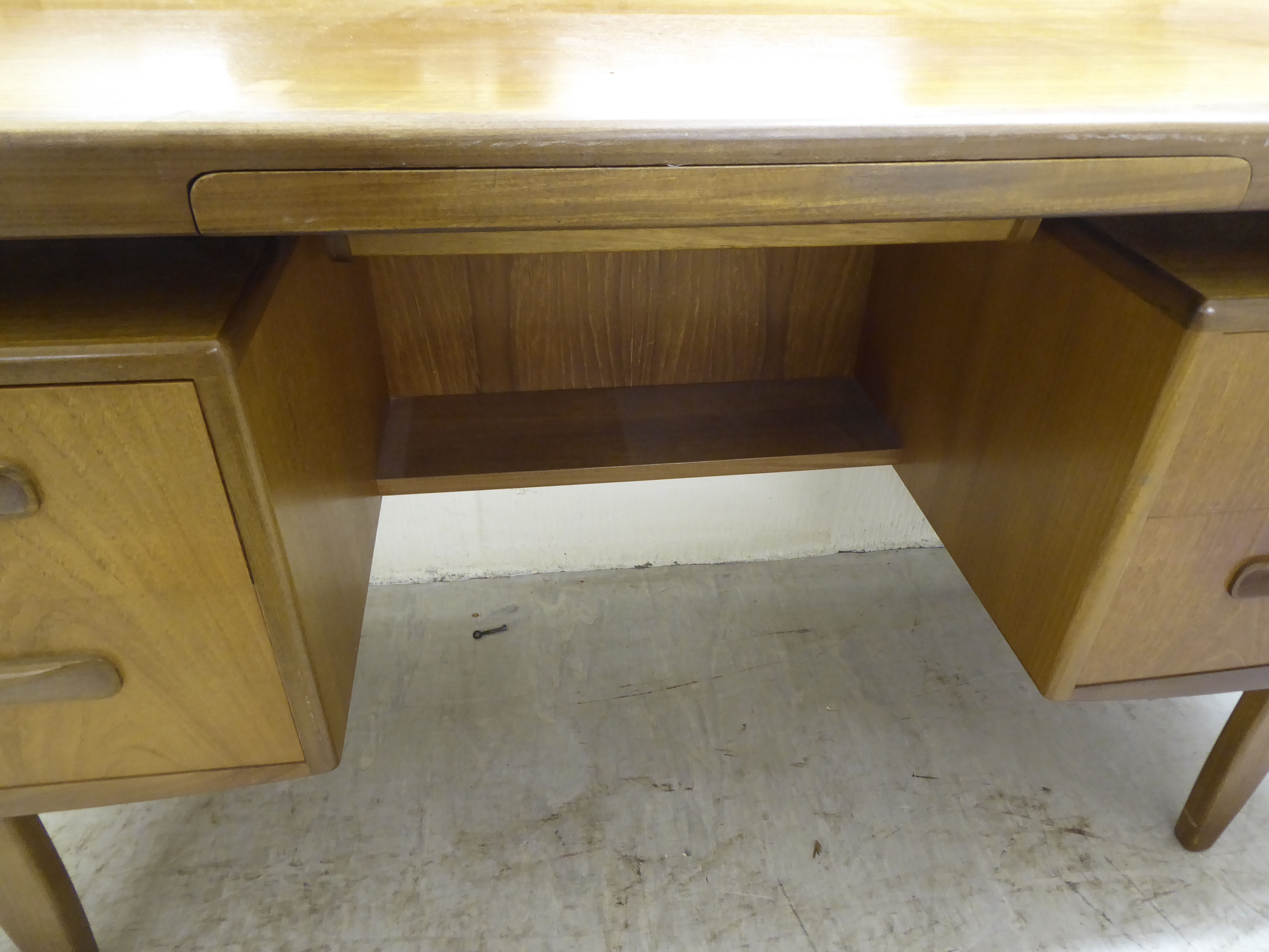 A G-Plan teak kneehole dressing table, surmounted by a horizontal mirror, over an arrangement of - Image 3 of 6