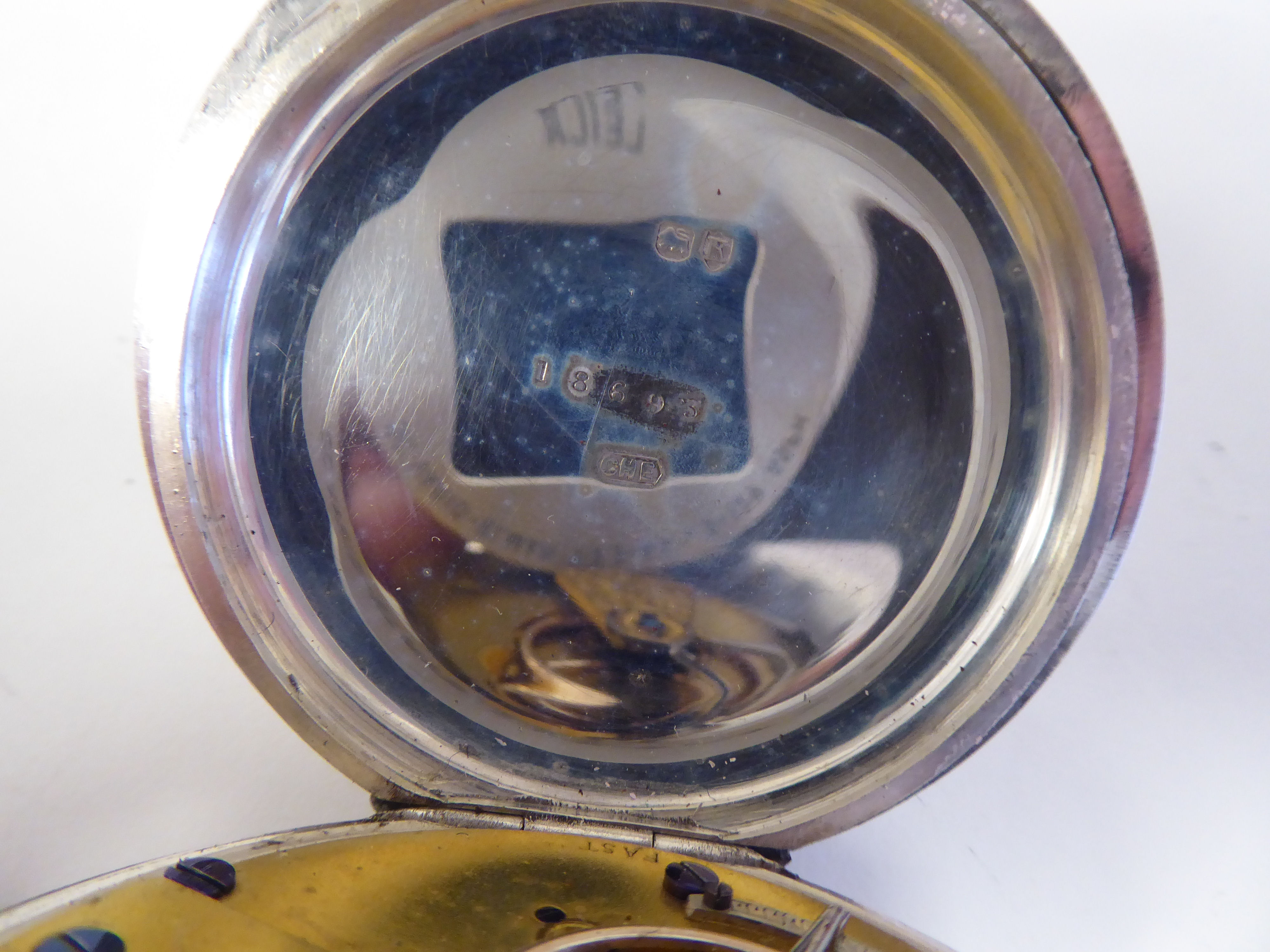 A silver pocket watch, the keyless movement faced by a white enamel Roman dial, inscribed Mahr, - Image 3 of 4