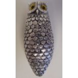 A Victorian style white metal novelty vesta case, fashioned as an owl with glass eyes