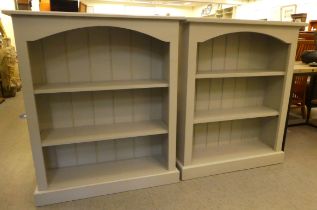 A pair of modern grey painted pine, open front dwarf bookcases, on a plinth  42"h  36"w