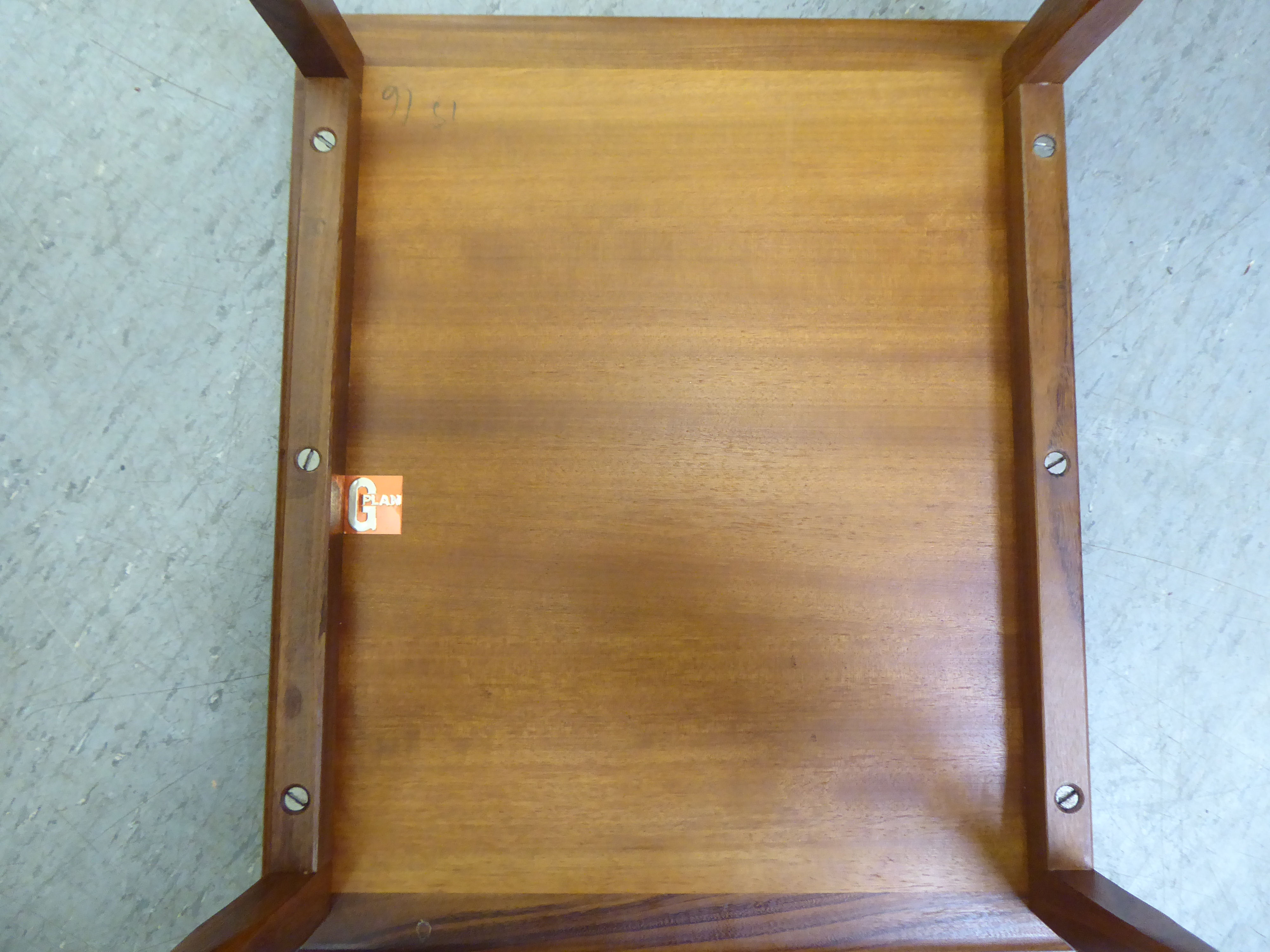 A nesting set of three G-Plan teak occasional tables, the largest top set with tiles, raised on - Image 4 of 5