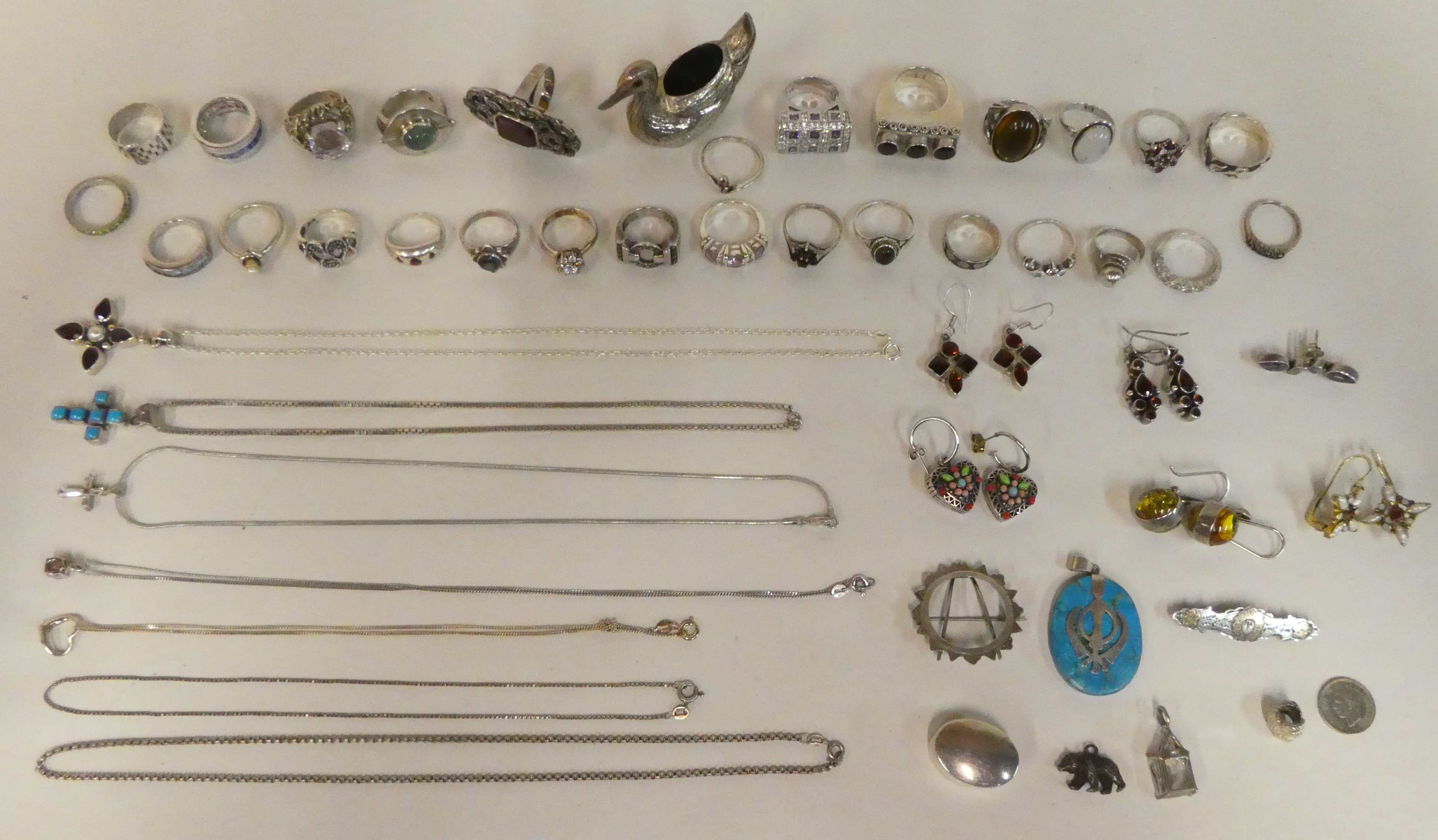Silver and white metal jewellery and collectables: to include rings and necklaces