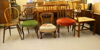 Small furniture: to include a late 19thC mahogany framed balloon back dining chair with a green