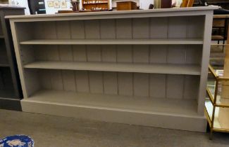 A modern grey painted pine, open front dwarf bookcase, on a plinth  33.5"h  60"w