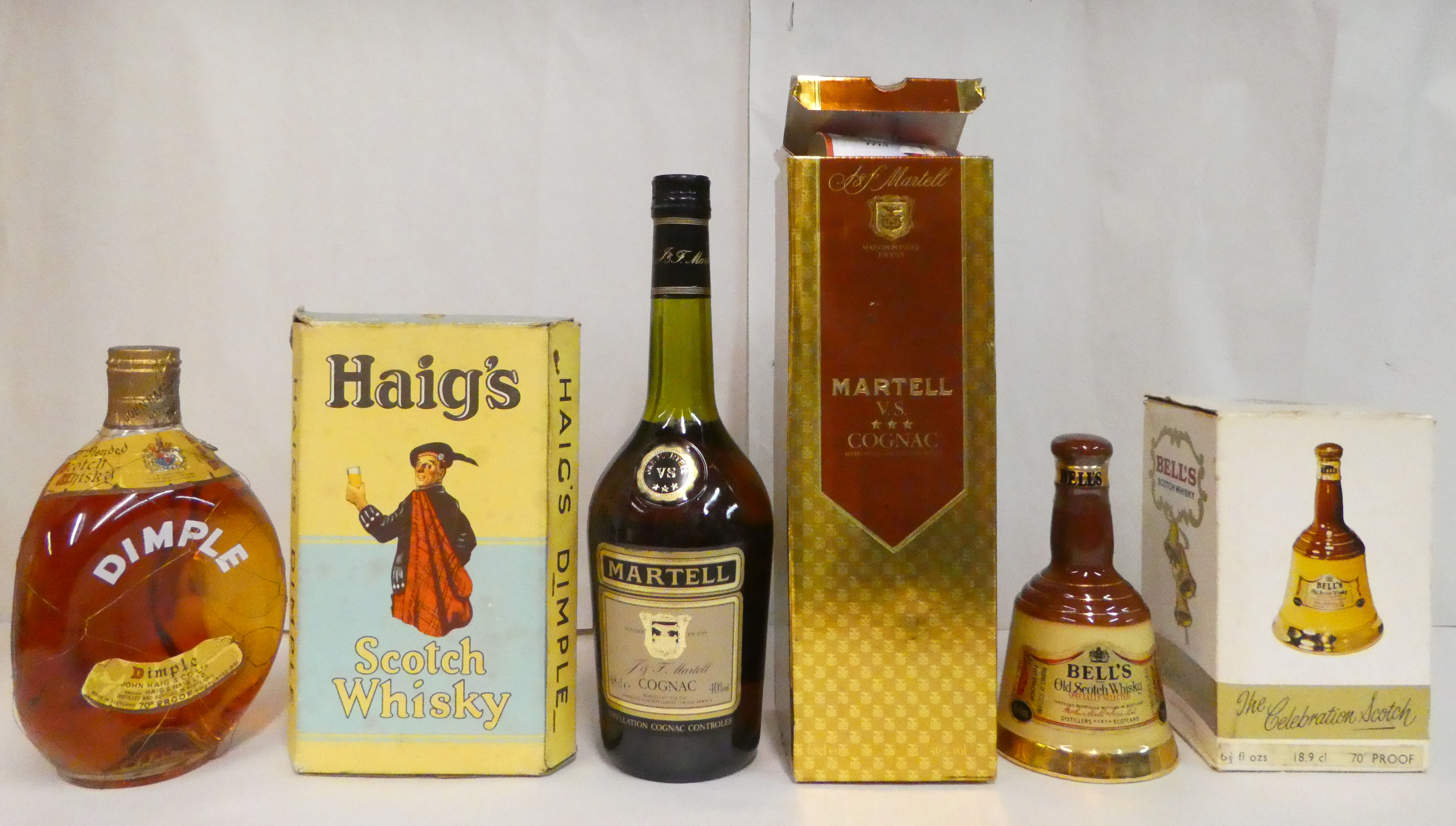 Alcohol, viz. a bottle of Martell Cognac; a bottle of Haig's Dimple; and a presentation decanter