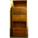 A Ladderax teak modular wall unit, comprising five cabinets  35"w; and five Ladderax side