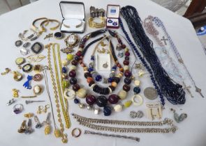 Yellow, white and other items of personal ornament: to include brooches; and bead necklaces