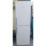 A Bosch Exxcel Frost Free, twin door, upright freezer  73"h  23"w