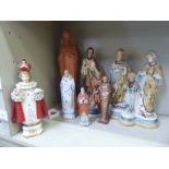 Seven early/mid 20thC plaster and ceramic religious figures: to include Mary, Joseph and young Jesus
