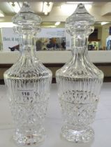 A pair of Waterford crystal decanters and stoppers  13"h