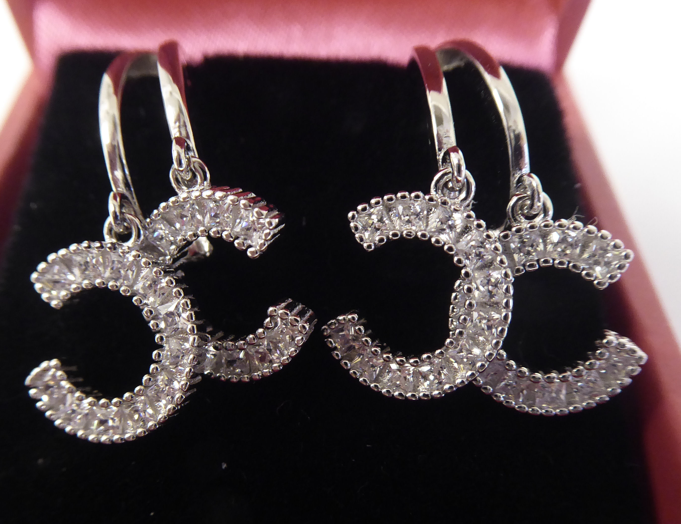 A pair of silver coloured metal designer earrings, set with cubic zirconia - Image 2 of 3