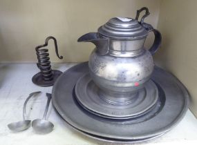 Mainly early 19thC pewter: to include a lidded jug; and two chargers  14"dia