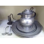 Mainly early 19thC pewter: to include a lidded jug; and two chargers  14"dia
