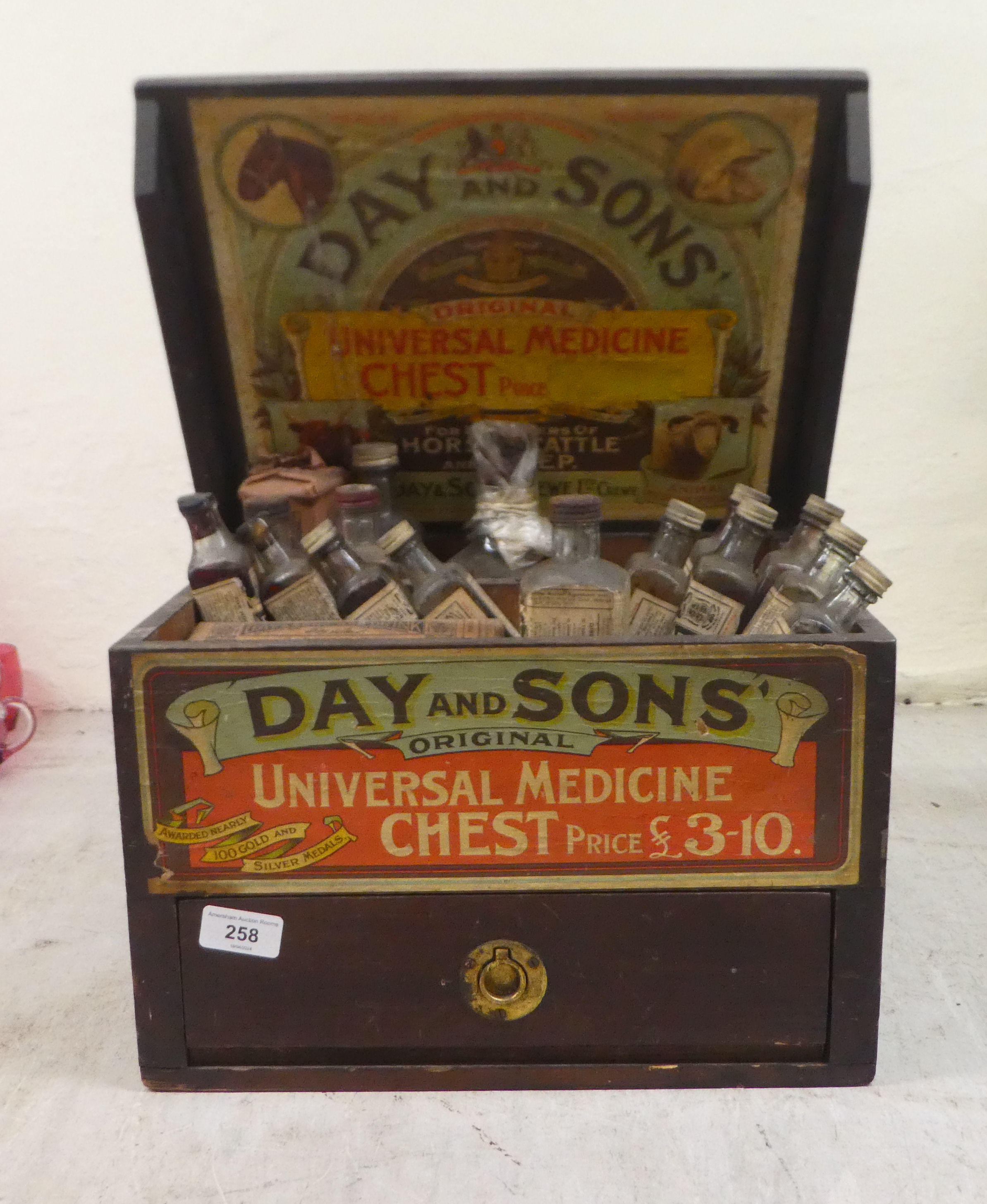 An early 20thC Day & Sons Original wooden Universal medicine chest, primarily for animal husbandry