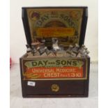 An early 20thC Day & Sons Original wooden Universal medicine chest, primarily for animal husbandry