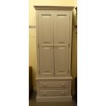 A modern grey painted pine wardrobe with two doors and two drawers, on a plinths  79"h  28"w
